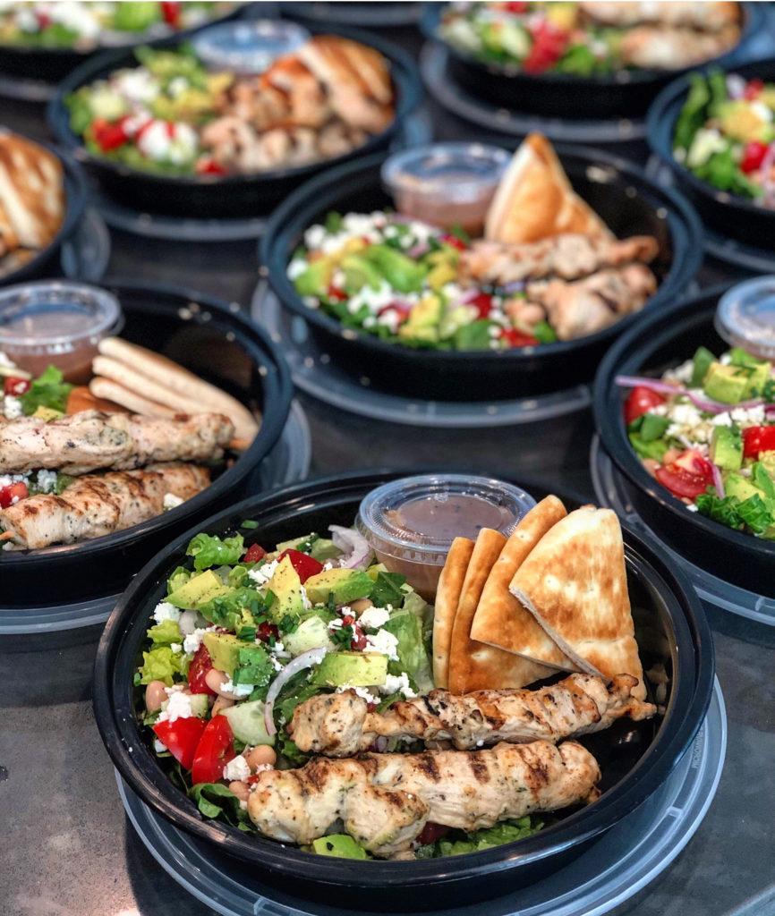 Greek salad with chicken and pita bread